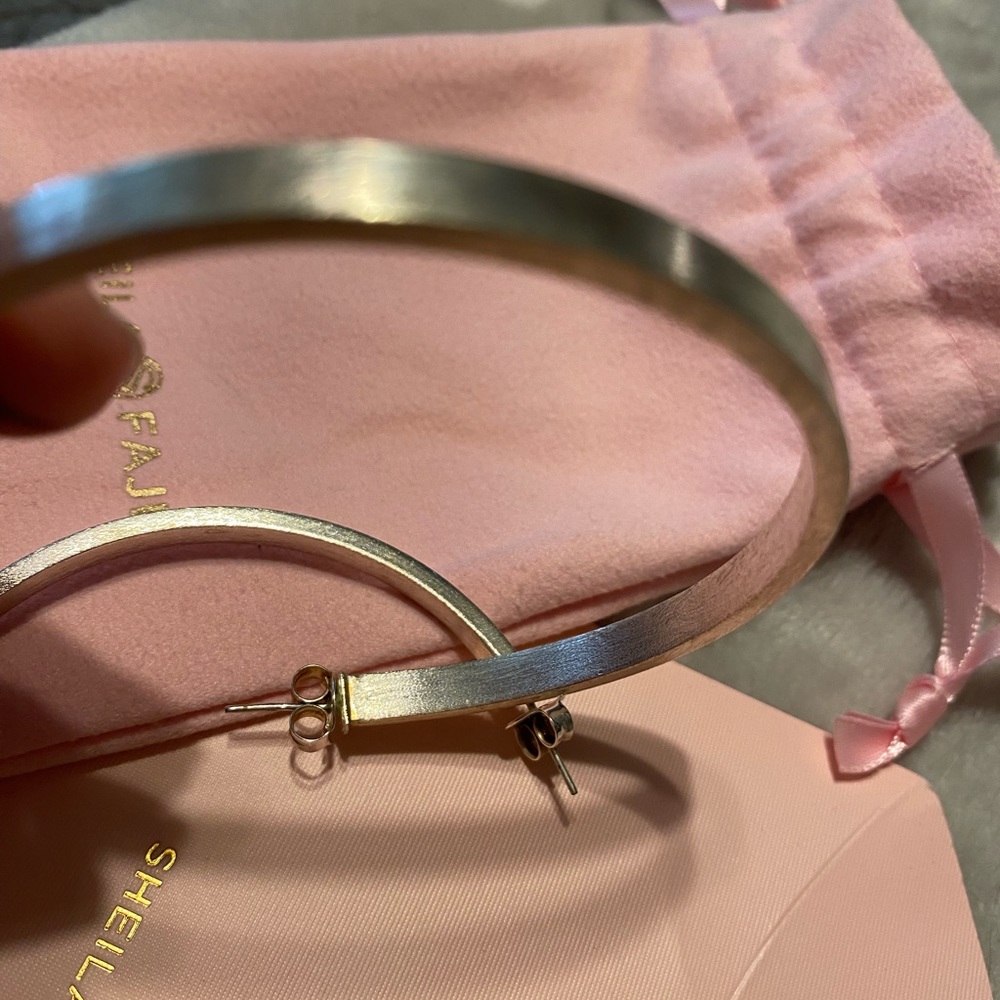 Shelia Fajl brushed silver Lunaria large hoops. Used